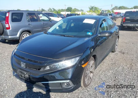 2019 Honda Civic Touring z USA, uszkodzony, nr VIN 19XFC1F93KE201639